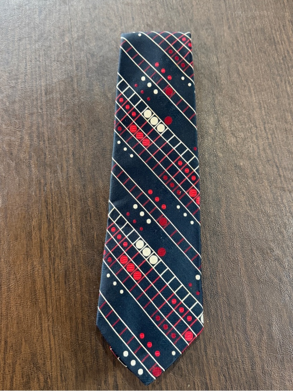 Cognizanti Men's Navy Blue Tie with Red & White Geometric Dot Pattern
